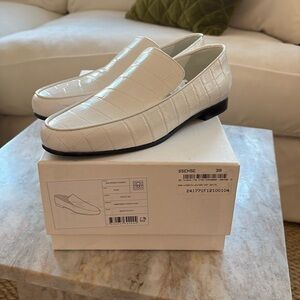 NWT Toteme
The Oval croc-effect leather loafers
